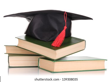 Grad Hat With Books Isolated On White