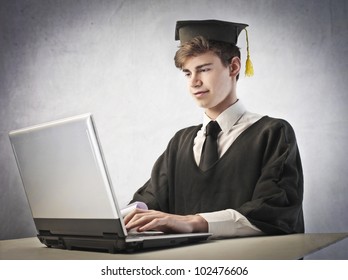 Grad Student Using A Laptop