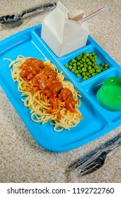 Grade School Lunch Tray Of Italian Spaghetti And Meatballs With Green Peas Milk Carton And Gelatin