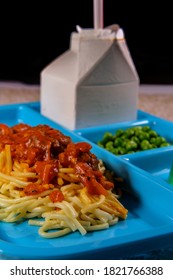 Grade School Lunch Tray Of Italian Spaghetti And Meatballs With Green Peas Milk Carton And Gelatin