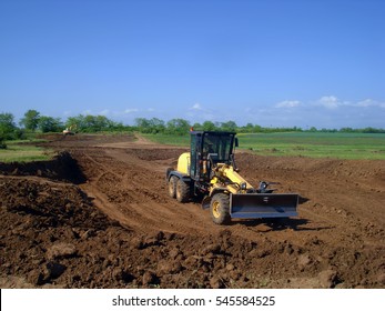 The Grader Working On Construction Site