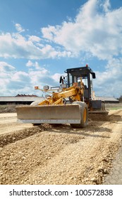 Grader working at road construction site