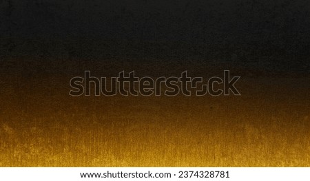 gradient background of dark black and shiny gold fabric wallpaper looks like metal use as background. texture for luxury, rich mood and tone. modern black backdrop concept for deluxe design.