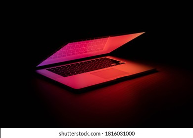 Gradient Glowing Laptop At Dark