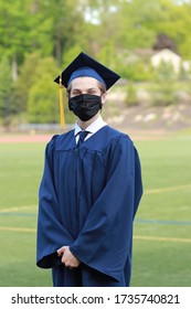 Graduate In Cap, Gown And Face Mask