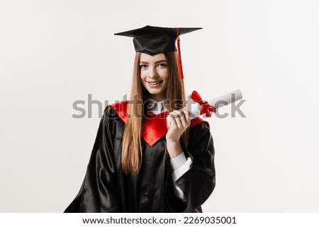 Graduate girl graduated from university and got master degree. Graduation. Happy graduate girl smiling and holding diploma with honors in her hands on white background