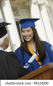 Graduate Receiving Her Diploma