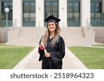 Graduating student celebrating academic achievement. Blond girl celebrate graduation. Portrait of woman wear graduation gown, College student with gradiation certificate, celebrating at university. 