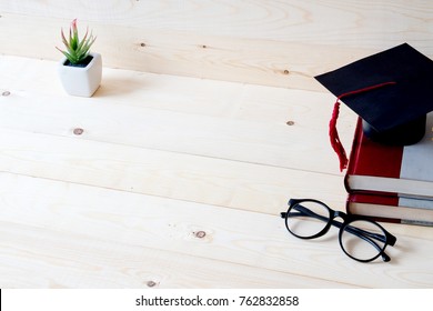 Graduation Cap, Hat On Wood Table Graduation Concept.