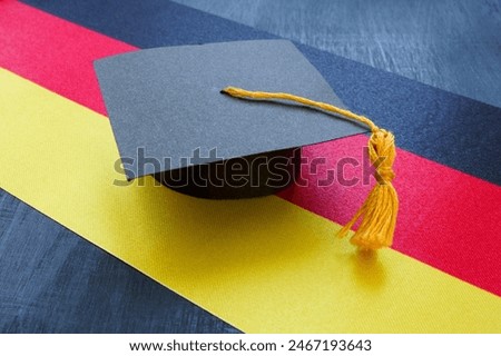 The Graduation cap on the German flag as a symbol of education in the country.