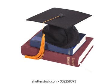 Graduation Cap On Stuck Of Books Isolated