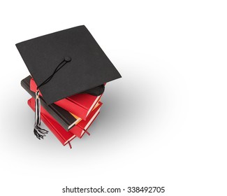 Graduation Cap On Top Of A Stack Of Books