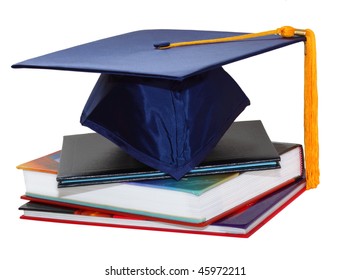 Graduation Cap Over Black Leather Diploma Cover And Books