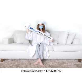 Graduation Day During Coronavirus Pandemic With Cap And Gown.