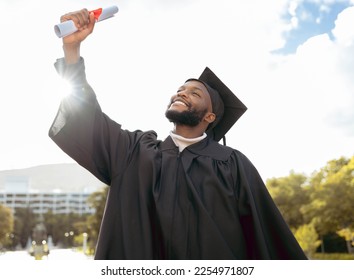 Graduation event, diploma and black man celebrate achievement, success and smile. Happy graduate, education certificate and winner of university goals, learning award and student motivation of future - Powered by Shutterstock