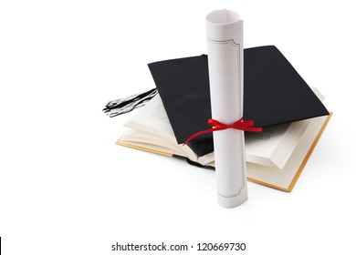 Graduation hat, book  and diploma
