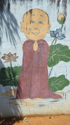 Grafiti O Dibujo Del Niño Buda En La Pared De Un Monasterio