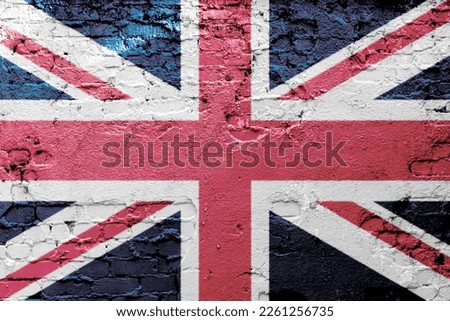 graffiti of national flag of the uk painted on the rusty wall