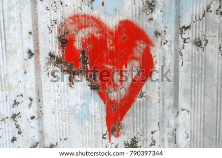 Similar – UT Only floating is more beautiful I Painted heart on the house wall