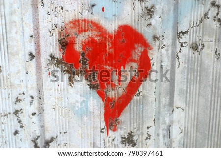 Similar – UT Only floating is more beautiful I Painted heart on the house wall