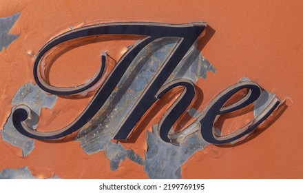 graffiti on the wall; definite article from a signboard; close-up of the definite article "THE" from a signboard on a wall. - Shutterstock ID 2199769195