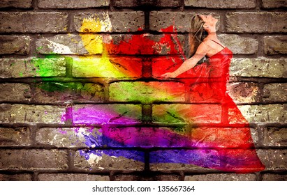 Graffiti Of A Woman In Colorful Dress On A Brick Wall