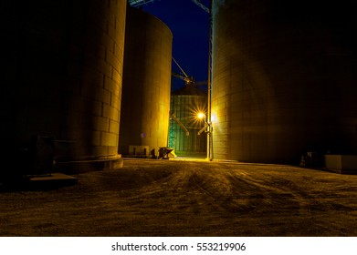 Grain Bins At Night In The Midwest