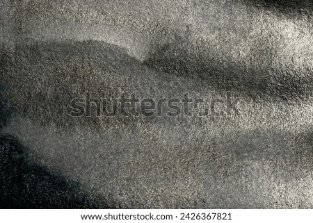 Grain black watercolor paper texture blot painting wall. Abstract  copy space blank background.