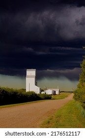 Grain Elevator In Thunderclouds, Alberta, Canada