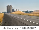  Grain Elevator and Wheat Pile. A stockpile of wheat at a grain elevator in Creston, Washington State, USA.

                              