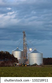 Grain Elevators With Full Moon