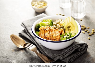 Grain And Grilled Chicken Bowl For Lunch With Pearl Barley, Avocado And Broccoli