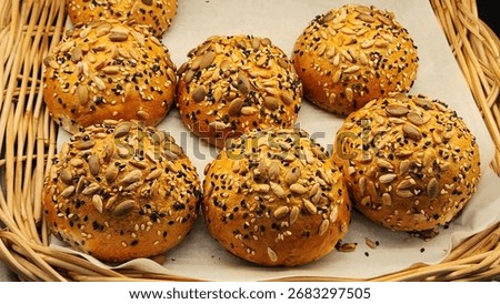 A grain roll or multigrain bread, which is a bread that contains a variety of grains.