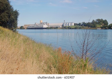 Grain Storing Depot Along The Sacramento River Delta, California