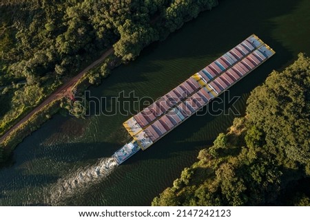 grain transport barge going up the tiete river - tiete-parana waterway