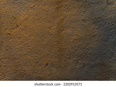 Grained Dark Yellow Wall Texture Or Background 