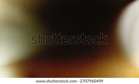 Grainy light leak texture gradient background abstract blur vintage film effect warm brown soft focus retro style artistic mood faded color dreamy atmosphere