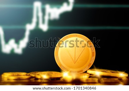 GRAM cryptocurrency; TON blockchain; GRAM golden coin on the background of the chart
