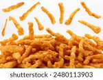 gram flour sticks snacks some in air isolated on white background