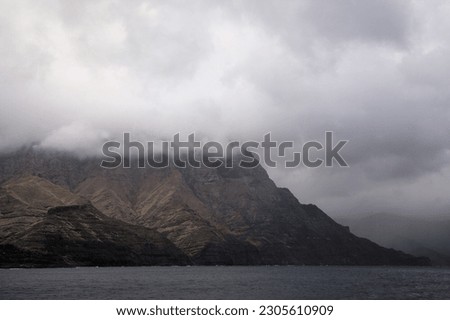 Gran Canaria, steep eroded north west coast of  Agaete municipality, view from Puerto de Las Nieves
port towards Faneque,  the second highest in Europe cliff