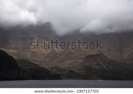 Gran Canaria, steep eroded north west coast of  Agaete municipality, view from Puerto de Las Nieves
port towards Faneque,  the second highest in Europe cliff