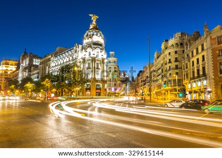 Gran Via, main shopping street in Madrid, Spain at dusk