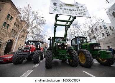 Granada, Andalusia, Spain. 19th February 2020 : Demonstration Of Farmers Protesting Against Unfair Prices Of Agricultural Products, Near The Bullring With Banners And Tractors