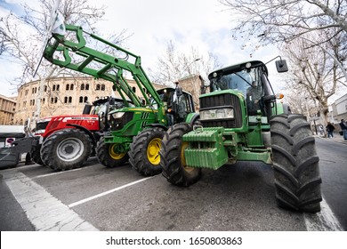 Granada, Andalusia, Spain. 19th February 2020 : Demonstration Of Farmers Protesting Against Unfair Prices Of Agricultural Products, Near The Bullring With Banners And Tractors