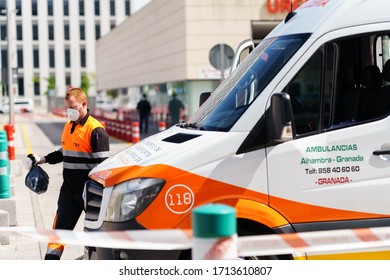 GRANADA SPAIN 23RD APRIL 2020. Ambulance Driver Who Just Cleaned The Vehicle Using A Mask During Covid-19 Pandemic