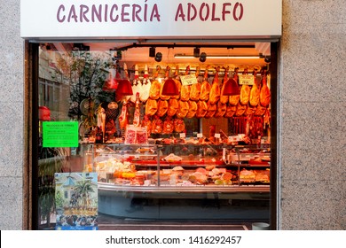 GRANADA, SPAIN -April 13, 2019: The Beautiful Exterior Facade Of A Local Butcher Shop In The Old Town