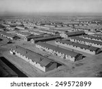 Granada War Relocation Center, the official name of a internment camp for Japanese Americans. During World War 2, the Colorado barracks was surrounded by barbed-wire fencing.