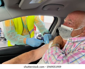 Granada,Spain. 6 May 2021 - Vaccination With Pfizer's Covid-19 Coronavirus Vaccine Continues. Older Man Getting Vaccinated Inside His Car.