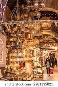  Grand Bazaar in Istanbul with unidentified people. It is one of the largest and oldest covered markets in the world, with 61 covered streets and over 3,000 shops - Shutterstock ID 2281135021