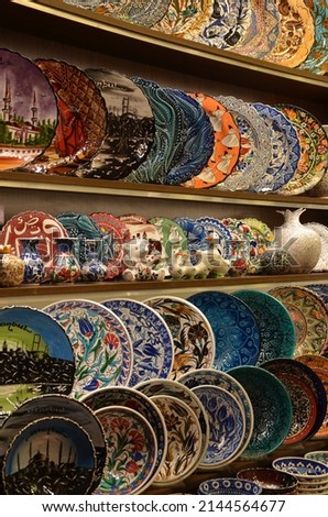 Grand bazaar market Istanbul Turkey spices herbs lamps souvenirs meat ceramics decorative objects supermarket people trade colrful style oriental shop traditional store craft plates tourists landmark